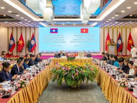 Việt Nam và Lào chia sẻ kinh nghiệm về xây dựng và triển khai chính sách phát triển KT-XH