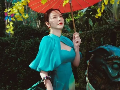 "Kiều nữ" Lý Nhã Kỳ khoe khoe nhan sắc rạng ngời trong tà áo dài đón Tết