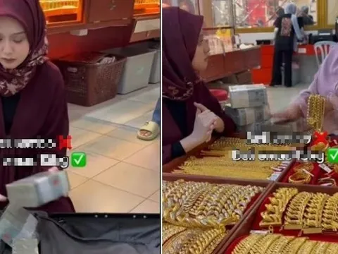 Xôn xao hình ảnh người phụ nữ mang vali tiền mặt để mua 15kg vàng ở Malaysia