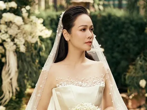 Ca sĩ Nhật Kim Anh bất ngờ diện váy cưới, danh tính chú rể gây tò mò?